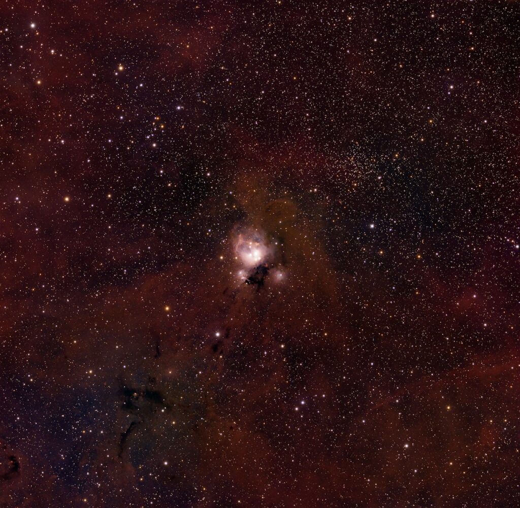 Star cluster in a colorful nebula